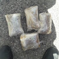 کشف ۴ کیلوگرم مواد مخدر در بار گوجه‌فرنگی در همدان